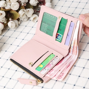 Pink cherry embroidered leather wallet interior with multiple card slots and cash pocket