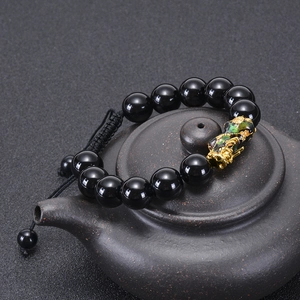 Black obsidian-like 12mm bead bracelet with golden Pixiu and Six-Character Mantra