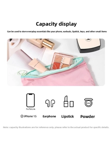Pink portable cosmetic pouch showing capacity for lipstick, earphones, and makeup essentials
