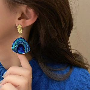 Artistic fan-shaped earrings with blue-green gradient textures and golden wavy edges