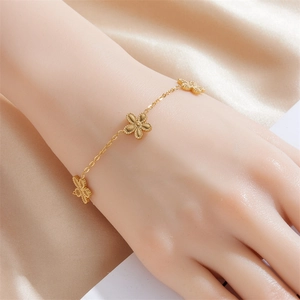 Gold plated stainless steel five-petal flower bracelet with polished chain for women