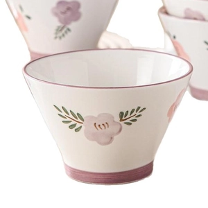 Ceramic cone bowl with floral glaze pattern showing high-end aesthetic dinnerware set