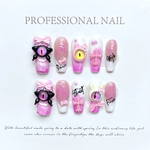 Pink press-on nails set featuring 3D cartoon monsters, crosses and gradient art