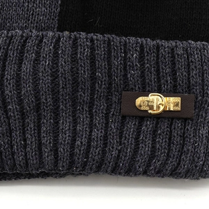 Thick knit winter beanie with fleece lining and premium leather tag with metal buckle
