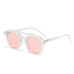Retro double bridge round sunglasses with transparent frame and peach pink lenses