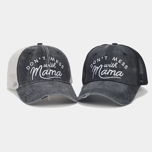 Detail of vintage ponytail baseball caps featuring embroidery and breathable mesh mesh