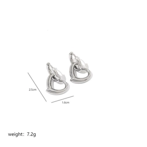 Detailed dimensions of silver hollow heart earrings showing 2.5cm height and 1.6cm width