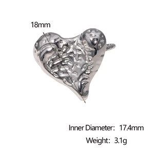 Detailed view of silver heart ring with hammered texture and 17.4mm inner diameter specs