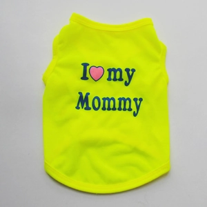 Flat lay of neon yellow dog vest featuring blue I love my Mommy print and heart graphic