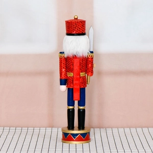 Back view of 36cm wooden nutcracker soldier with red sequins and gold trim ornament