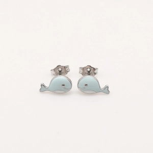 Macro shot of silver whale stud earrings with light blue enamel and small ear nut backings