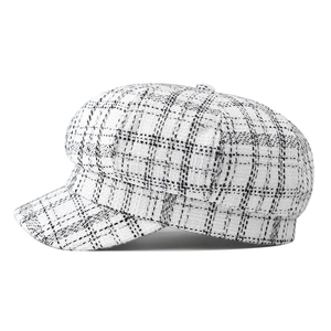 Classic black and white plaid tweed newsboy cap for women with retro textured finish