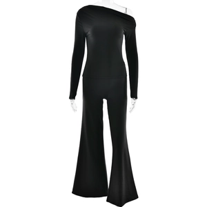 Women's chic black two-piece set with one-shoulder long sleeve top and wide-leg pants