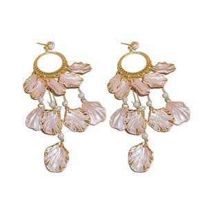 Bohemian gold hoop earrings with pink resin flower petals and white pearls