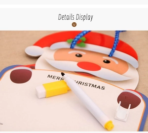Close-up of Santa Claus whiteboard with yellow eraser and marker pen for kids