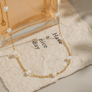 Elegant 18K gold plated stainless steel necklace with natural freshwater pearls