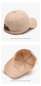 Detail showing distressed edges and metal adjustable strap buckle on the khaki baseball cap