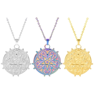 Macro detail of gothic pentagram necklaces in silver, gold and rainbow finishes