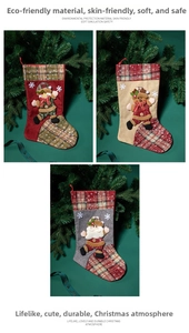 Detailed view of Christmas stockings with snowman, reindeer and Santa 3D patterns