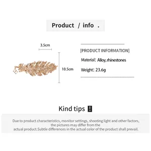 Detailed sizing guide showing dimensions of 10.5cm for the rhinestone feather brooch