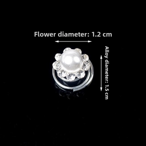 Detail view showing 1.2cm pearl rhinestone flower with 1.5cm spiral hair clip base