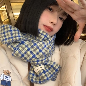 Plaid blue, yellow and grey houndstooth knit scarf with a small woven white label