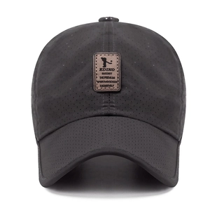 Breathable dark grey baseball cap with perforated fabric and leather logo patch