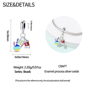 Detailed view of silver oxide art palm charm with size specs and jewelry usage