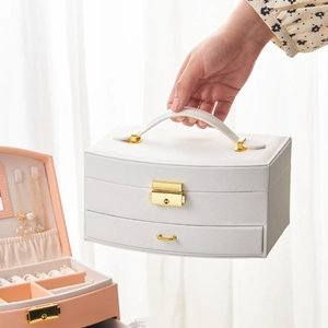 Elegant white leather multi-layer jewelry box with gold lock and portable top handle
