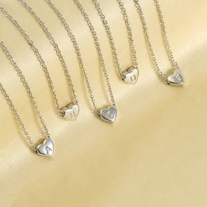 Silver stainless steel heart pendant necklaces with engraved letters on gold silk