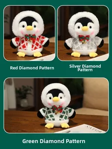 Detailed view of plush Christmas penguins with festive plaid bows in red, green and silver