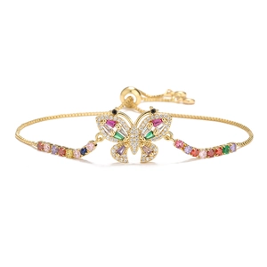 Close-up of butterfly bracelet with 18K gold plating and colorful zircon stones