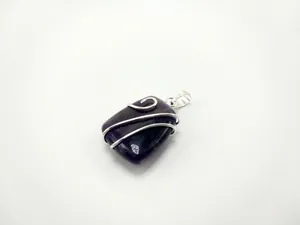 Handmade wire wrapped purple crystal pendant in silver finish with minimalist design