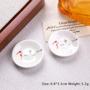 Detailed macro view of 3.5cm miniature koi fish print porcelain plate for dollhouses