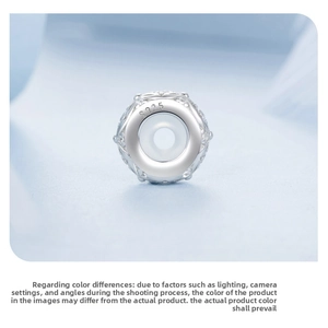 Macro shot of S925 sterling silver spacer bead with sparkling zircon inlay and hallmark