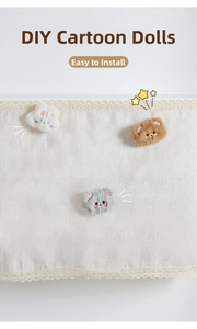 Close-up of soft plush DIY animal charms including rabbit and bear for AC wind deflector