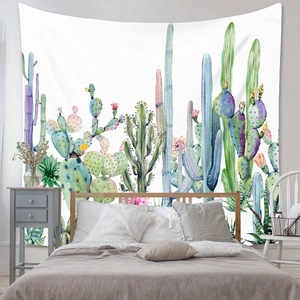 Detail of watercolor cactus wall tapestry showing vibrant desert plants in a bedroom