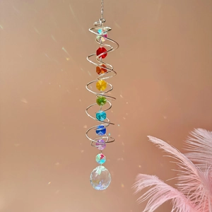 Detail of 3D spiral wind spinner with colorful crystal beads and a large prism ball