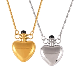 Minimalist heart-shaped kettle pendant necklace in gold and silver finish with snake chain