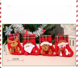 Size guide for mini Christmas stockings showing dimensions of the red festive gift bags