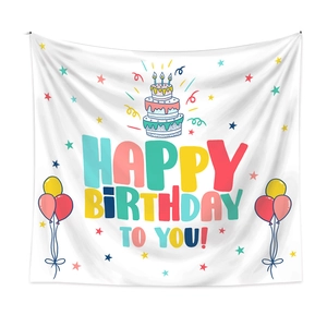 Detail of bohemian happy birthday tapestry with colorful cake and balloon prints
