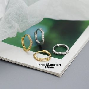 Detail of 10mm inner diameter wavy ear cuff set with pavé cubic zirconia accents