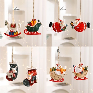 Artistic collection of festive resin Christmas ornaments featuring Santa and Snowman