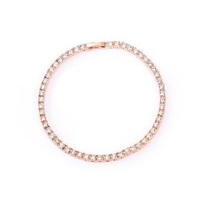 Close-up of rose gold tennis bracelet featuring round-cut clear cubic zirconia crystals