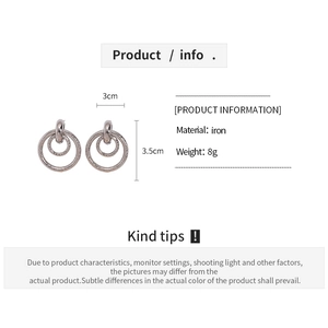 Detailed view of matte geometric hollow hoop earrings with iron material and size specs