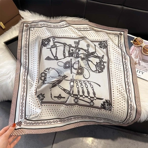 Detail of elegant 70cm square scarf with equestrian horse carriage and paisley patterns