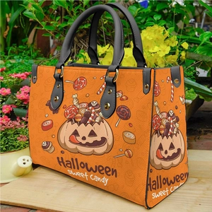 Orange Halloween handbag with pumpkin and candy prints made of pebbled PU leather