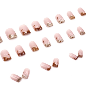 Cute brown cat cartoon design on short square press-on nails with soft nude pink base color