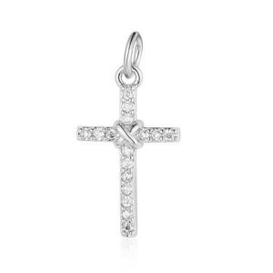 Macro view of silver cross pendant with sparkling zircons and a polished center knot