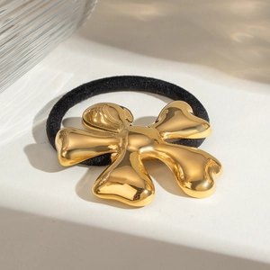 Detail of high-elasticity black hair tie with 18k gold irregular flower metal ornament